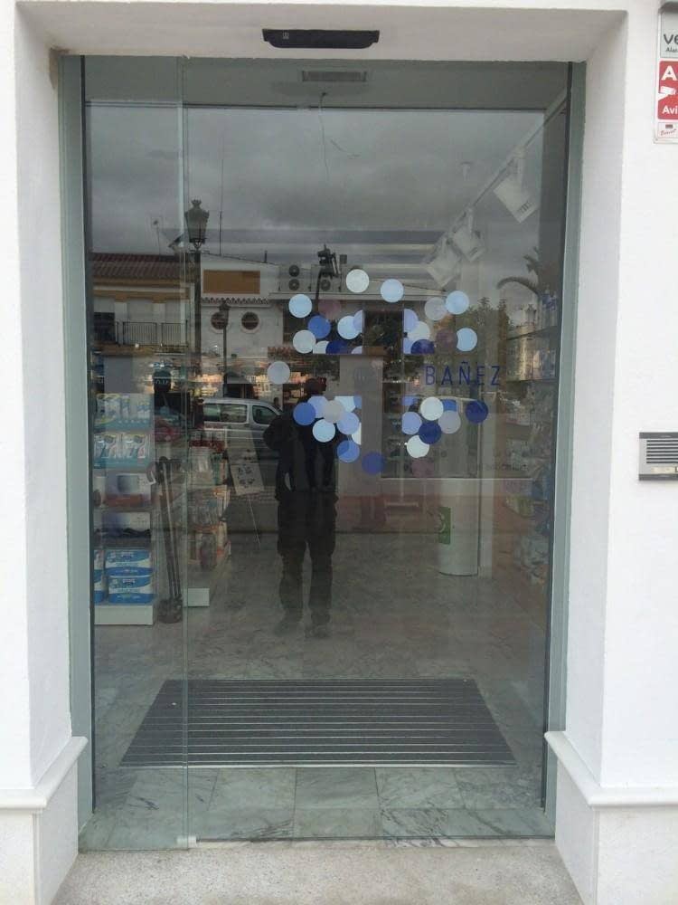 Instalación de puerta de cristal corredera en Almonte